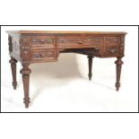 A 19th Century oak carved pedestal desk, single drawer above knee hole, flanked by a two drawers