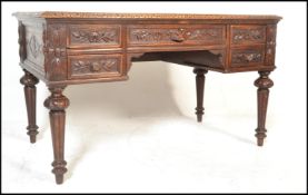 A 19th Century oak carved pedestal desk, single drawer above knee hole, flanked by a two drawers
