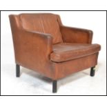 An original retro vintage mid century 1970's Danish made Borge Mogensen armchair. The square form