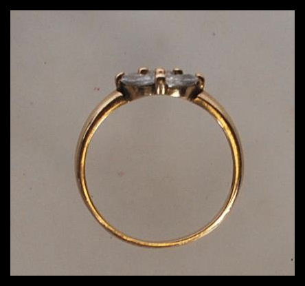 A stamped 375 9ct gold ring set with five white stones to the head. Weight 2.1g. Size O.5. - Image 4 of 5