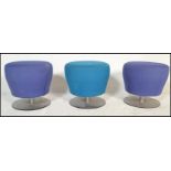 A set of three vintage retro contemporary mushroom stools, large oversized seat pads raised on
