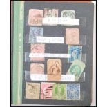 A small stamp album containing stamps from all around the world dating from the 19th Century to