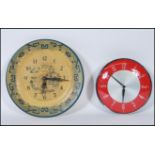 A 20th Century wall clock by Metamec having chrome ring with winding mechanism. Together with a