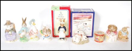A collection of Beatrix Potter Bunnykins figures to include figures by Beswick, Royal albert etc