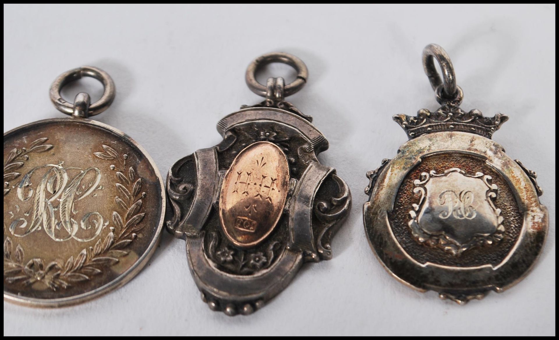 A collection of early 20th Century silver hallmarked sporting fob medals, two having gold plated - Image 4 of 8