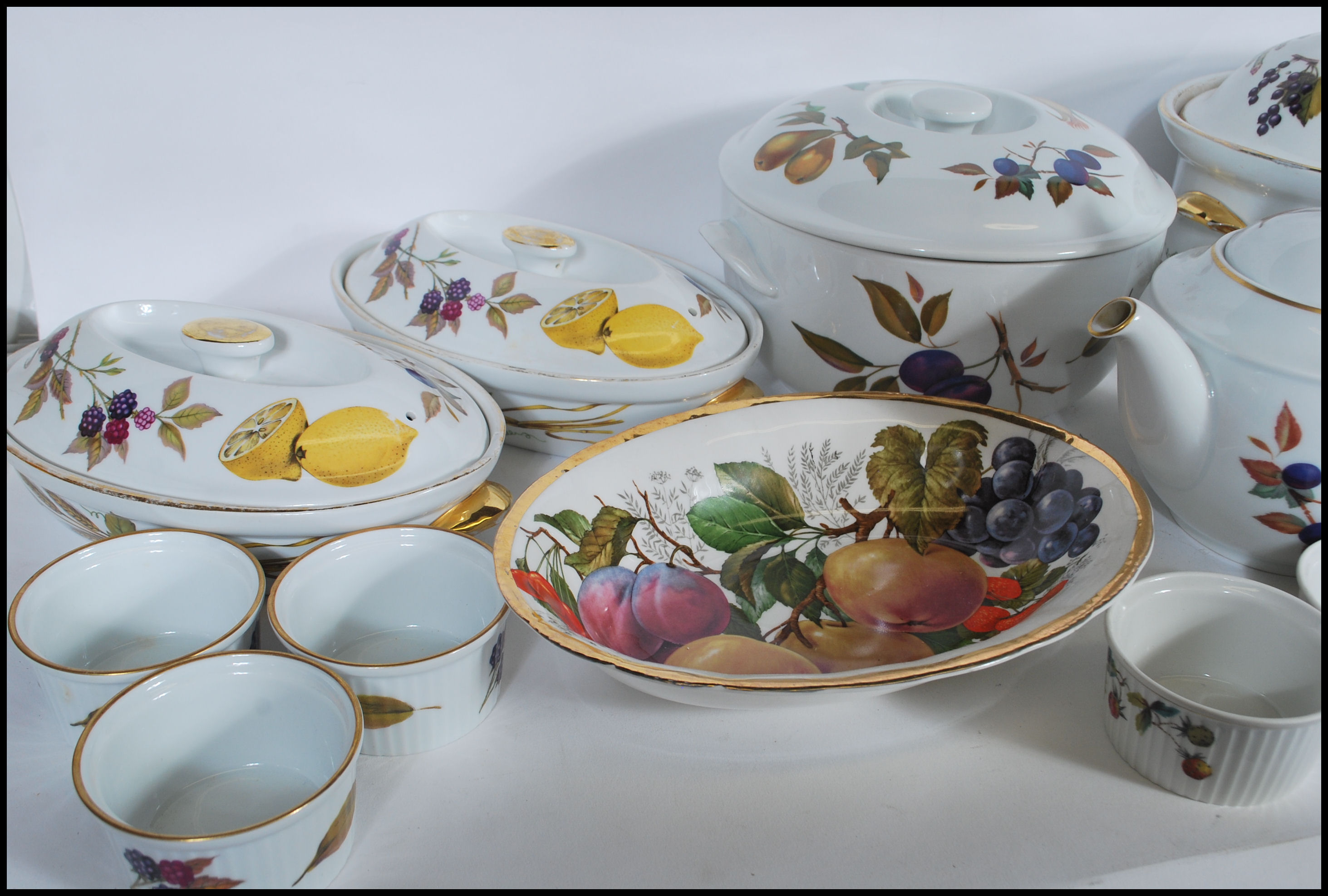 A good collection of Royal Worcester ' Evesham ' pattern ceramics to include teapot, tureens,