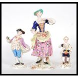 A Group of porcelain figurines to include a Crown