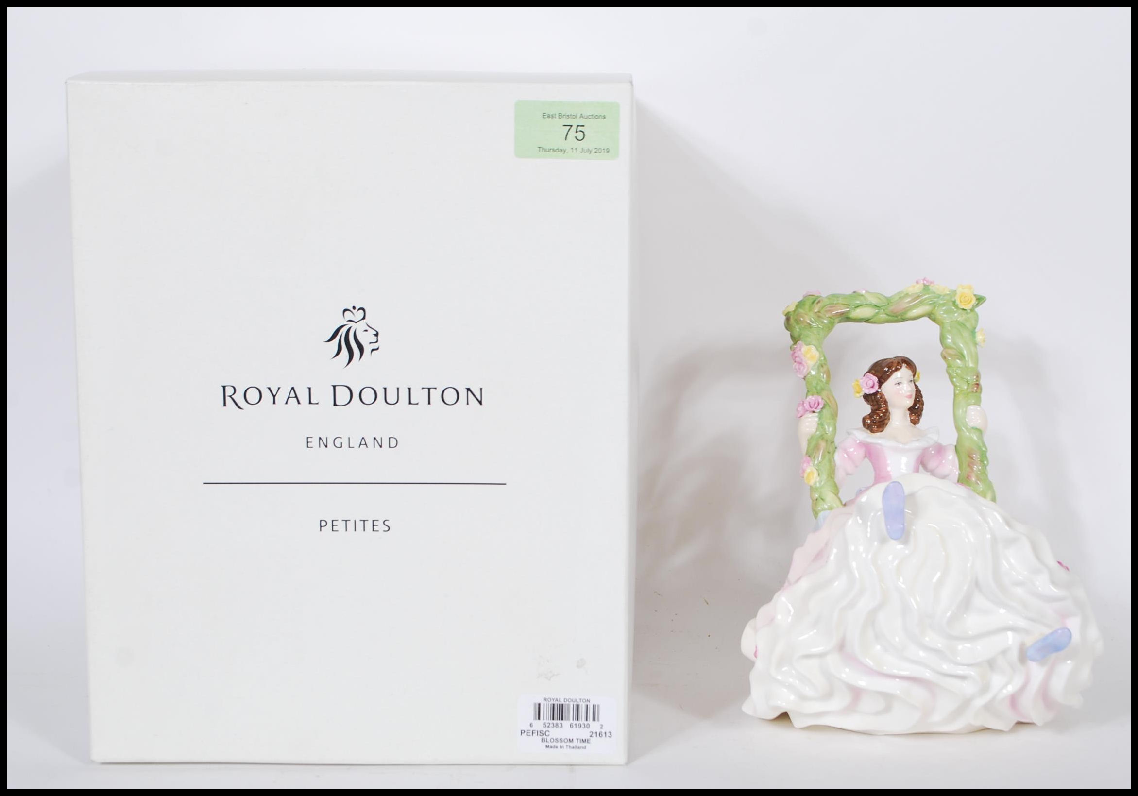 A collection of ceramic figurines comprising a Royal Doulton HN5096 Pretty Ladies Blossomtime /