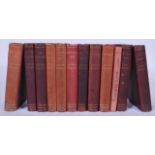 A collection of late 19th Century books by Charles Kingsley published by MacMillan & Co, being red