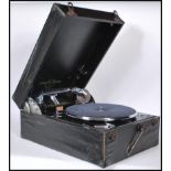 An early 20th century  Columbia portable gramophone complete in the original carry case with black