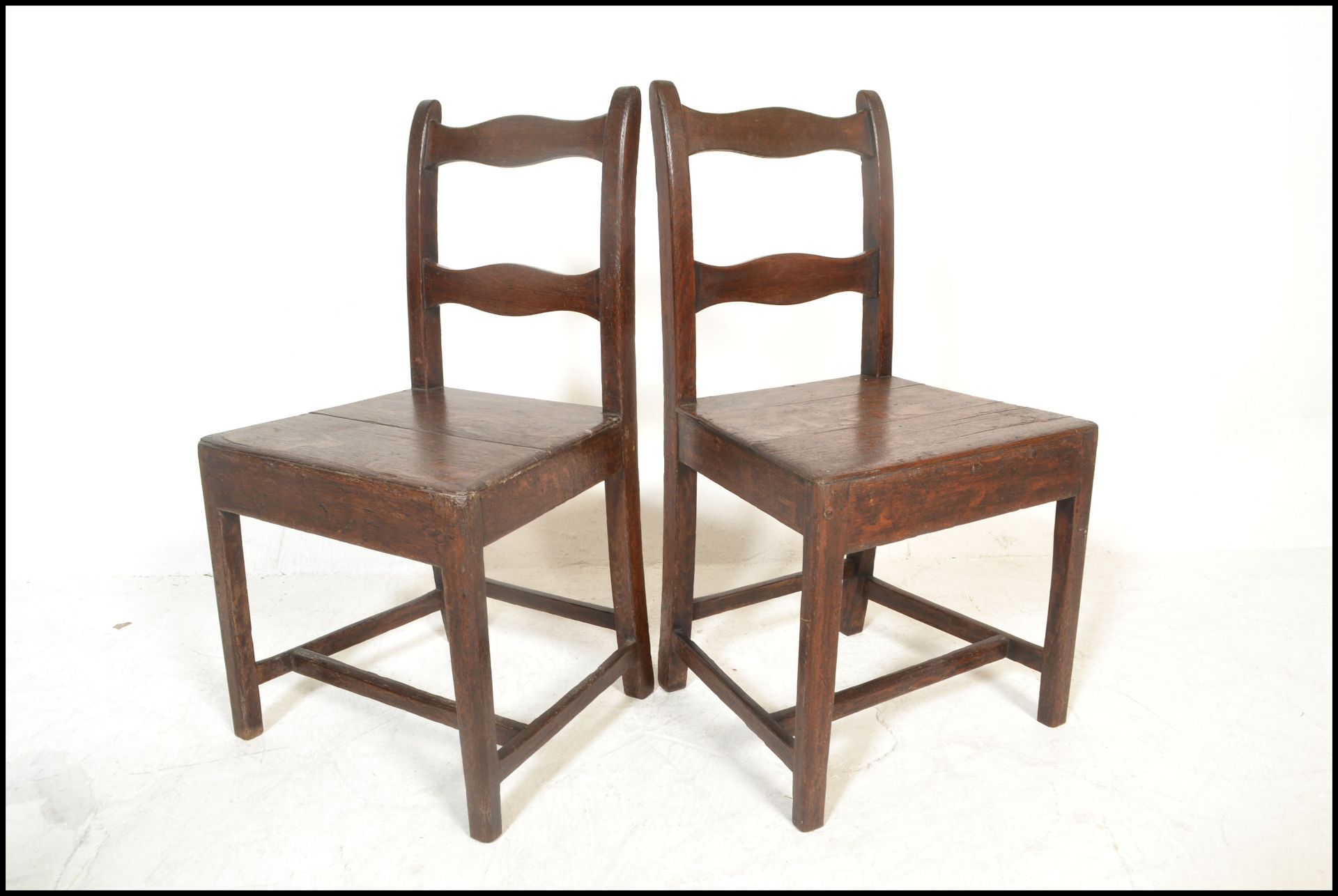 A set of four 18th / 19th Century Georgian country oak peg jointed  dining chairs, rail back with - Image 3 of 4