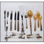 A collection of silver hallmarked flatware to include George Howson for Harrods knives, , silver