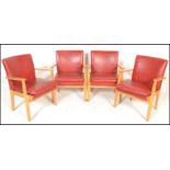 A set of four vintage retro Parker Knoll model 733 open framed armchairs, sweeping arms, seat pads
