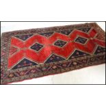A stunning believed early 20th Persian / Islamic rug believed to have been bought at Liberty of