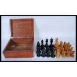 A 20th Century believed Staunton Chessmen boxwood and ebony Chess set by J. Jaques and Son Ltd of