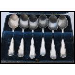 A cased set of 20th century silver hallmarked teaspoons complete in the original presentation case