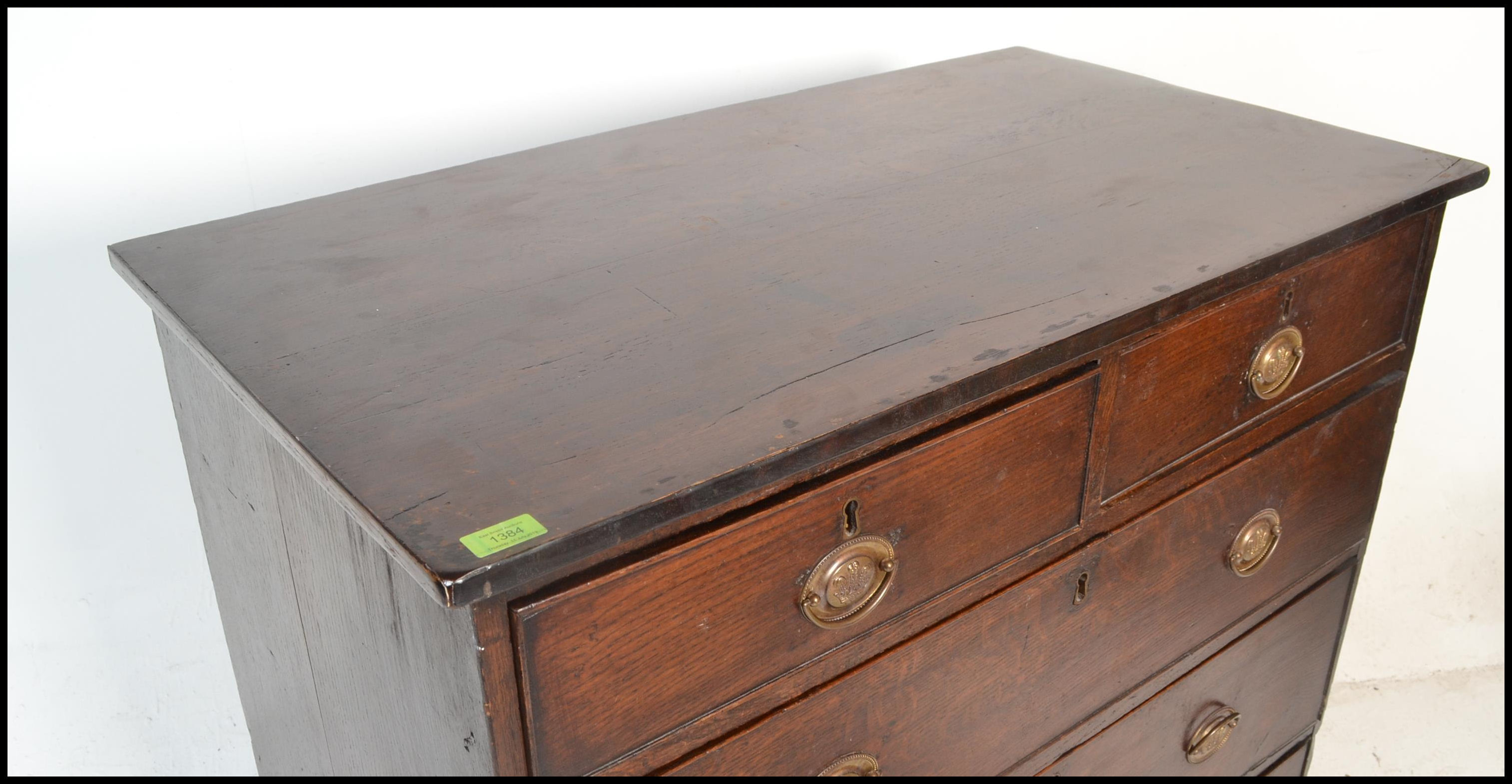A good 18th / early 19th century oak chest of drawers . Raised on bracket legs the upright chest - Image 3 of 7