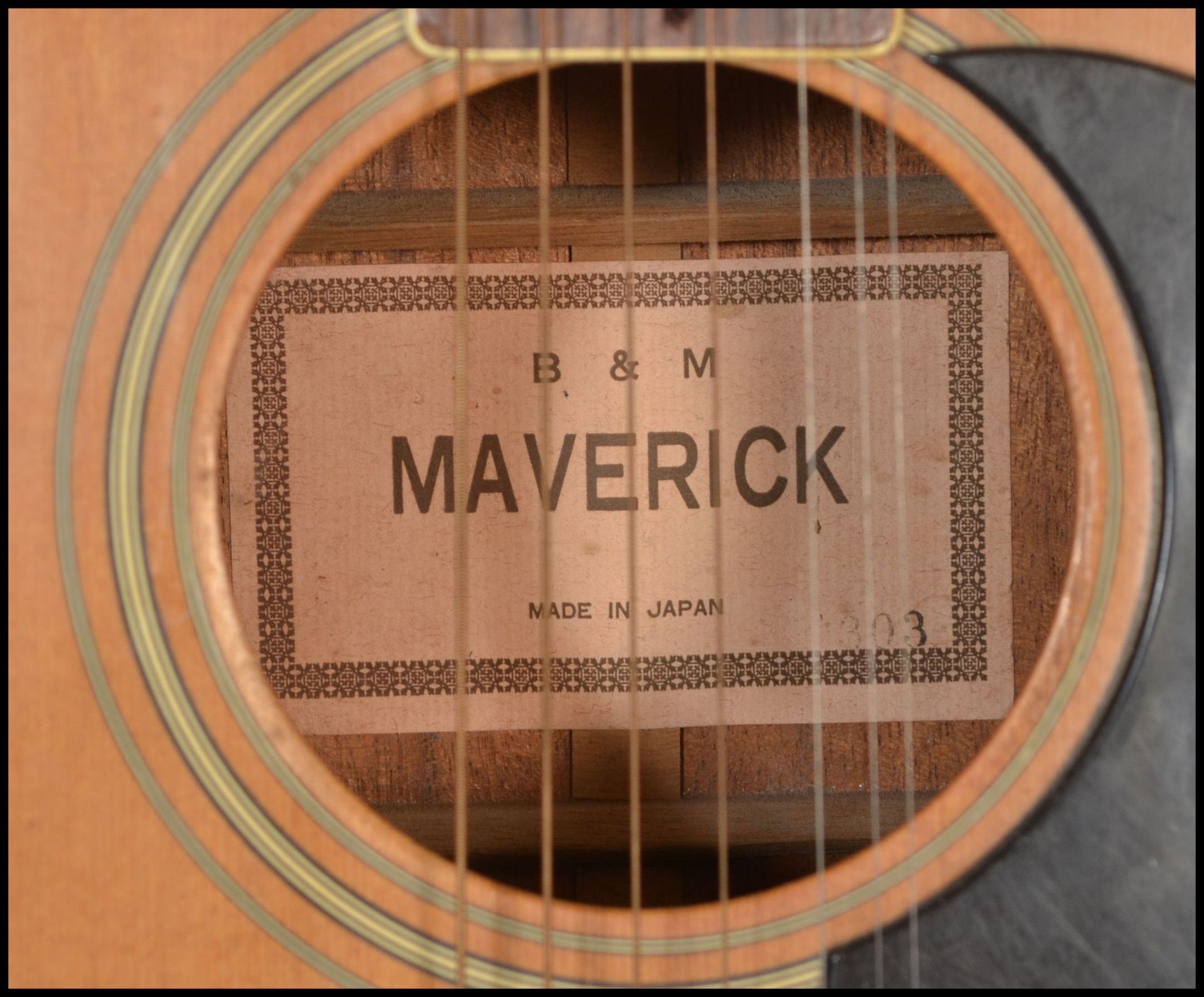 A twelve string acoustic guitar by B & M Maverick of typical form having chrome tuning pegs and - Bild 4 aus 10