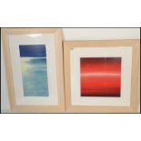 Two framed and glazed limited prints of seascapes, one being blue in colour as the tide  comes in