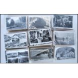 A large collection of vintage real photographic postcards. All B&W standard (small) size British