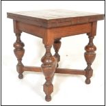 A 1930's small oak draw leaf dining table - side table. This rare small proportion shipping oak