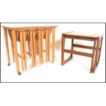 A G-Plan retro teak wood 1970's graduating nest of two tables in the Quadrille pattern. The tables