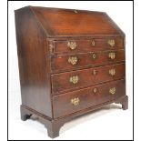 An 18th / 19th Century Georgian country oak  fall front bureau having a fully appointed interior