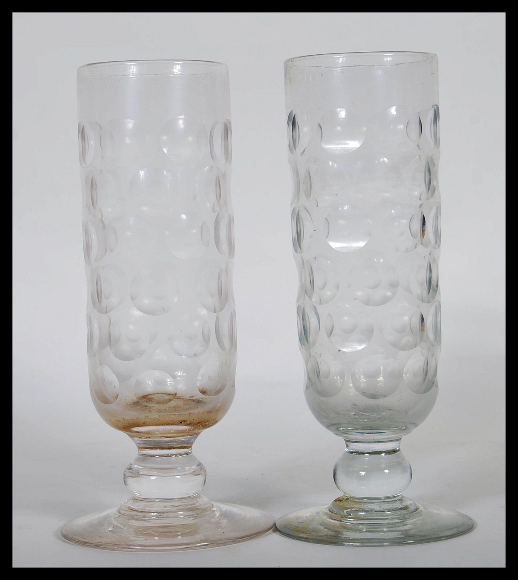A pair of Georgian drinking glasses having cylindr