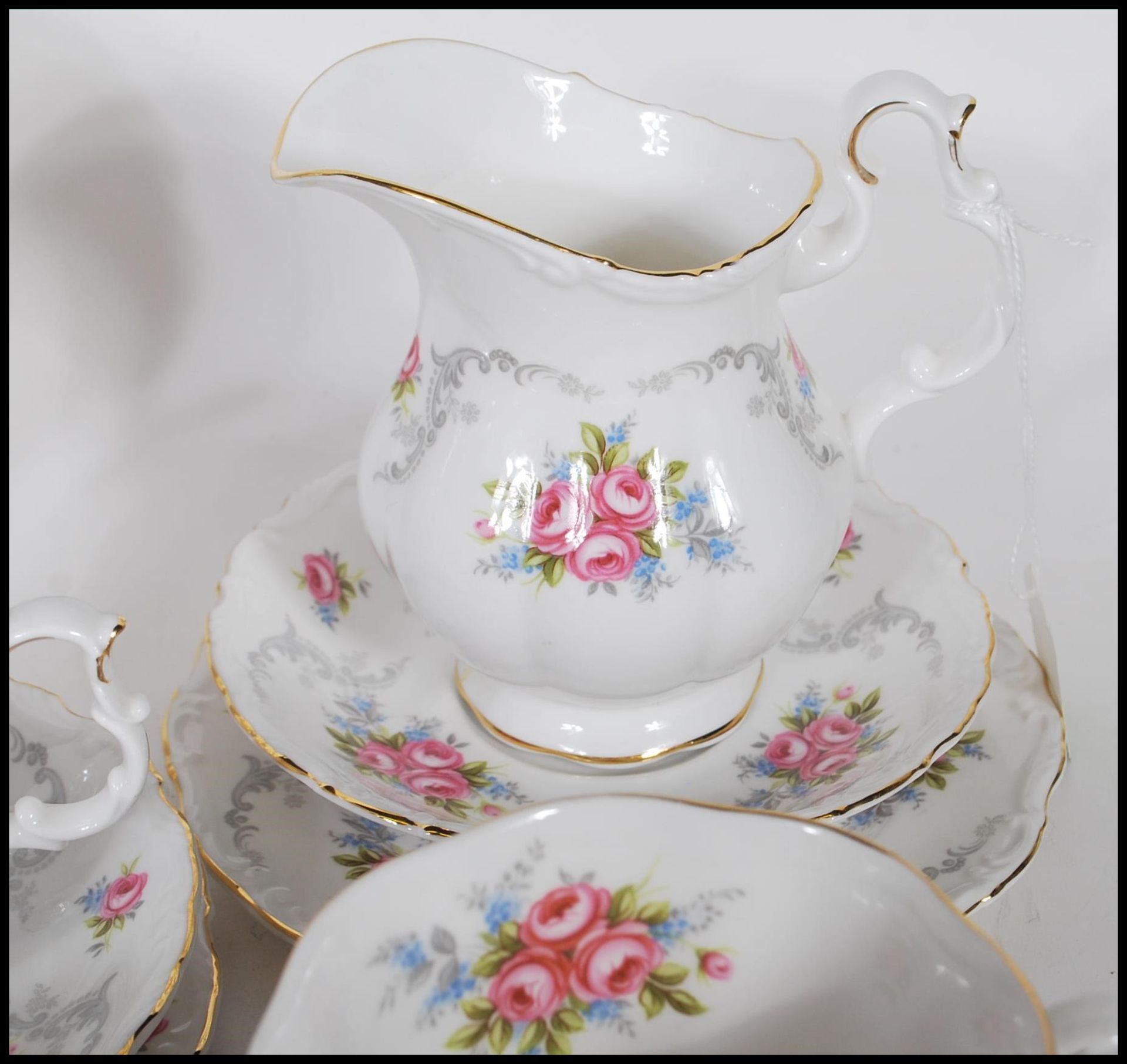 A Royal Albert tea service in the Tranquillity pattern having floral and gray foliate decoration - Image 6 of 8