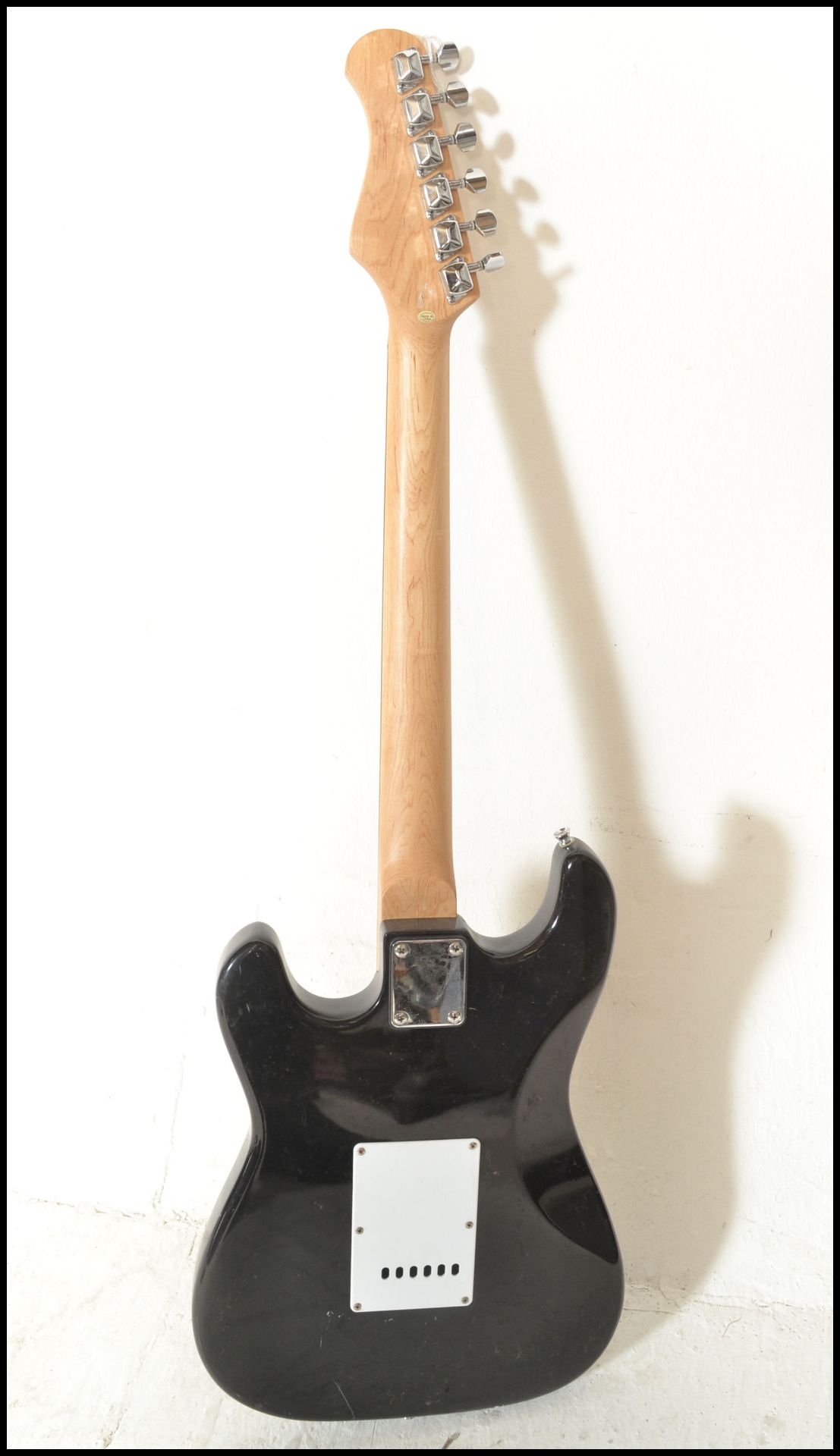 A vintage Rockburn electric six string guitar. The black body having white scratch guard with chrome - Bild 4 aus 5