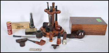 A good collection of smoking pipes and accessories to include many real Briar, reemers, cheroot