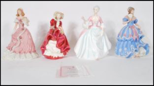 A collection of four ceramic figurines of ladies to include an early Royal Doulton figurine ' Top o'