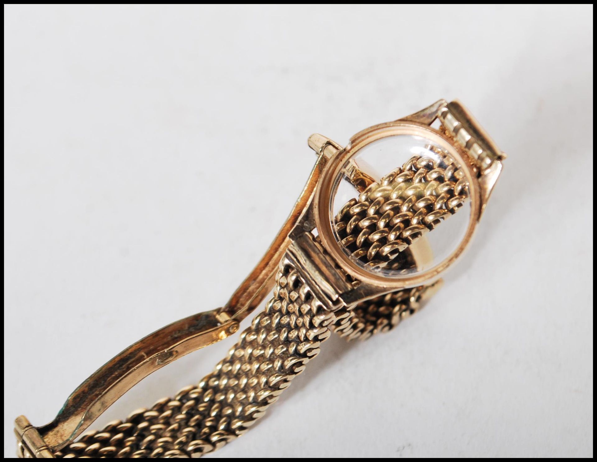 A vintage boxed Omega 9ct gold ladies cocktail watch set to a 9ct gold watch bracelet strap. - Image 8 of 8