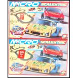 TWO MICRO SCALEXTRIC PORSCHE 911 SLOT RACING CAR SETS