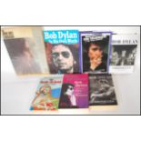 A collection of music interest books by Bob Dylan to include Chronicles Volume One on hardback and