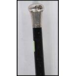 A 19th Century Victorian silver topped Opera walking stick having an ebonised shaft with a silver
