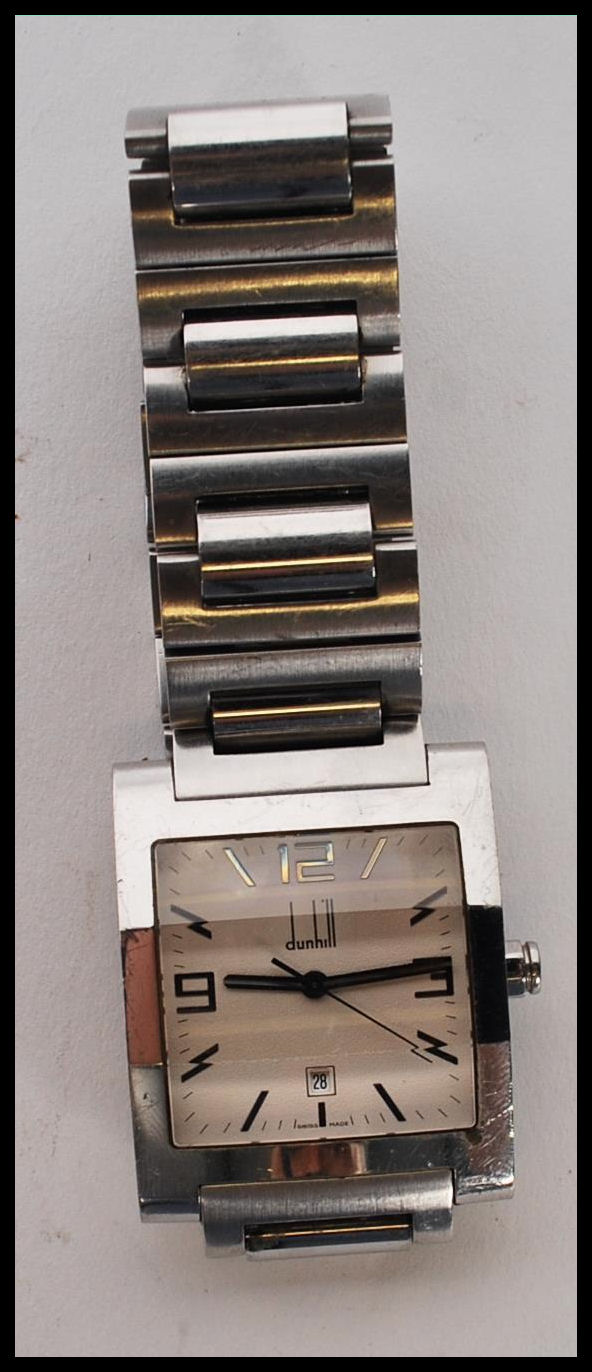 A gentleman's Dunhill facet watch having a square face with arabic numerals and baton markers to the