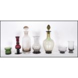 A collection of 20th Century glasswares to include an amethyst glass spill vase of knopped form, a