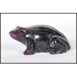 A 20th Century carved amethyst figurine in the form of a tropical frog.