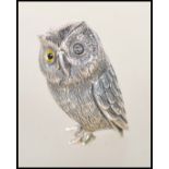 An unusual silver figurine  of an owl with glass eyes. Weight 18.0g.