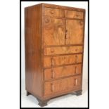 A early 20th Century Art Deco walnut veneered tall