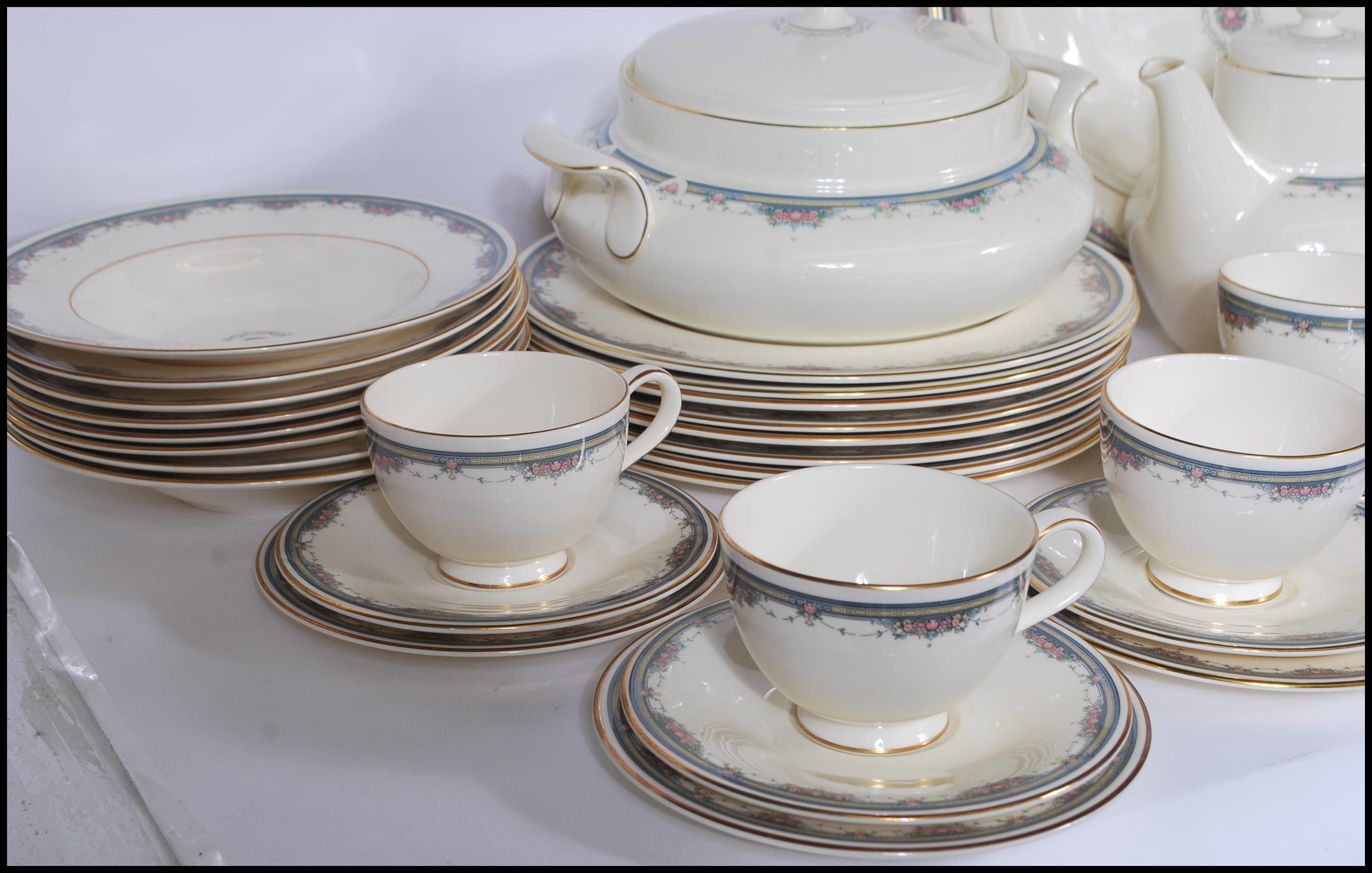 A 20th Century dinner and tea service by Royal Doulton in the Albany pattern having ivory white - Image 2 of 11