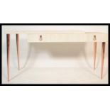 A vintage mid 20th Century Italian white two step staggered sideboard credenza by Cantori, having