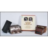 A late 19th Century Victorian rosewood 3D Stereoscope viewer together with a collection of slides