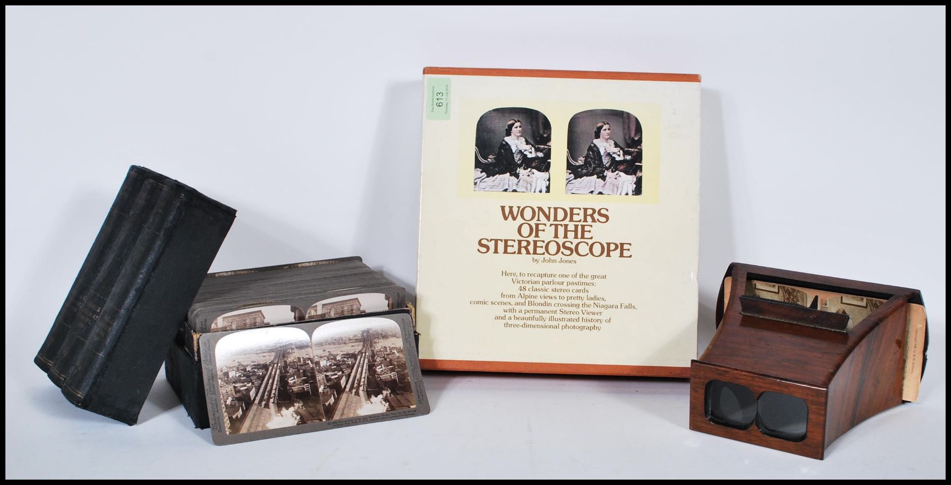 A late 19th Century Victorian rosewood 3D Stereoscope viewer together with a collection of slides