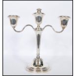 A silver hallmarked Mappin & Webb candelabra being raised on a round stepped base having a