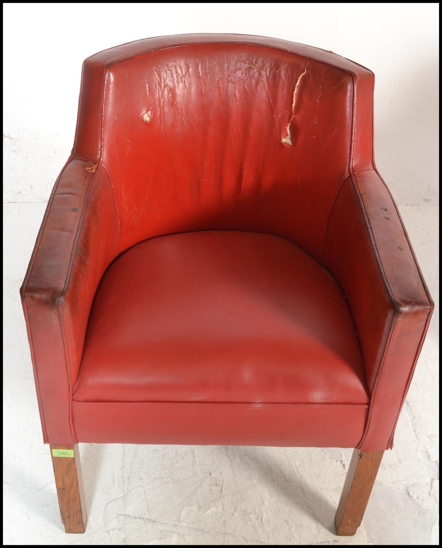 A pair of mid 20th Century tub / club / armchairs, raised on beech square supports, upholstered in - Bild 6 aus 6