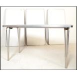 A set of 4 good quality small proportion folding trestle tables having plastic tops with banded