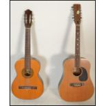 A twelve string acoustic guitar by B & M Maverick of typical form having chrome tuning pegs and
