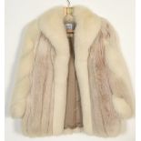 A vintage 20th Century ladies white fox fur short jacket, silk lining with makers label for F. K.